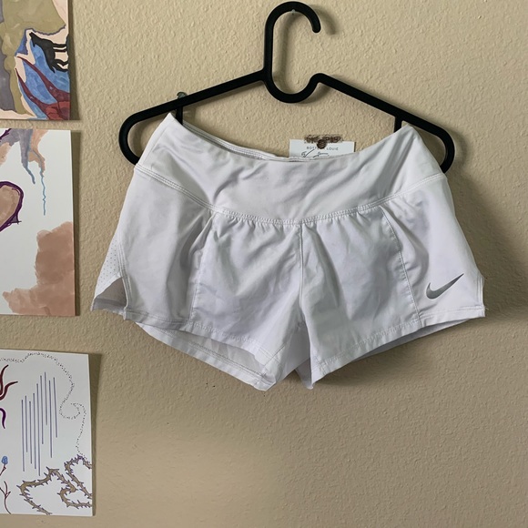 Nike Pants - Nike white running shorts size XS